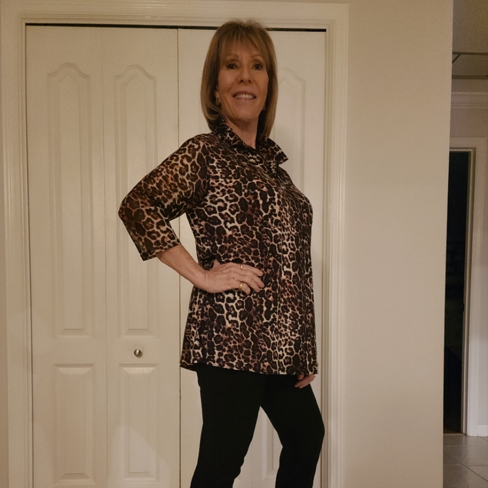 Animal print pullover top with zipper